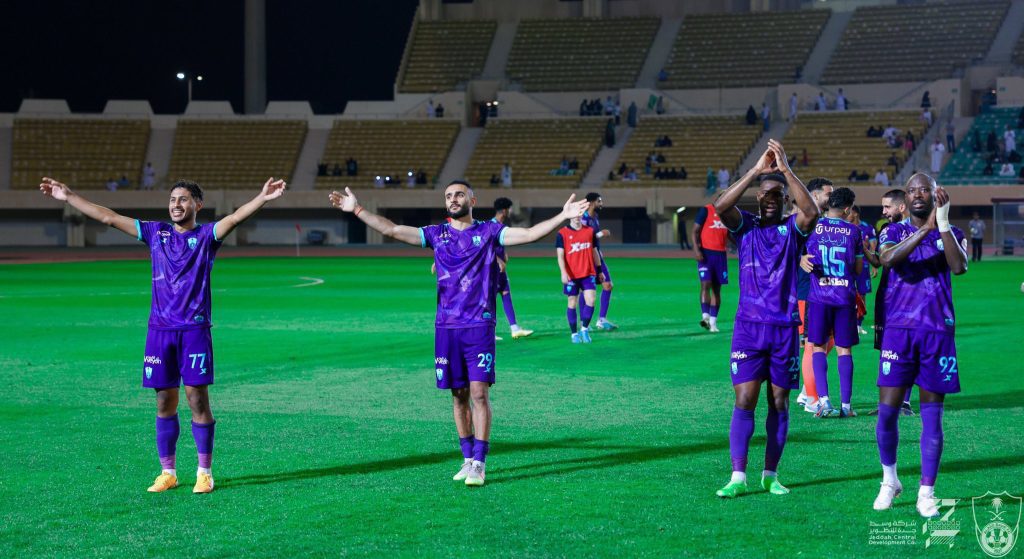 Al Ahli Saudi and teammates cheering.