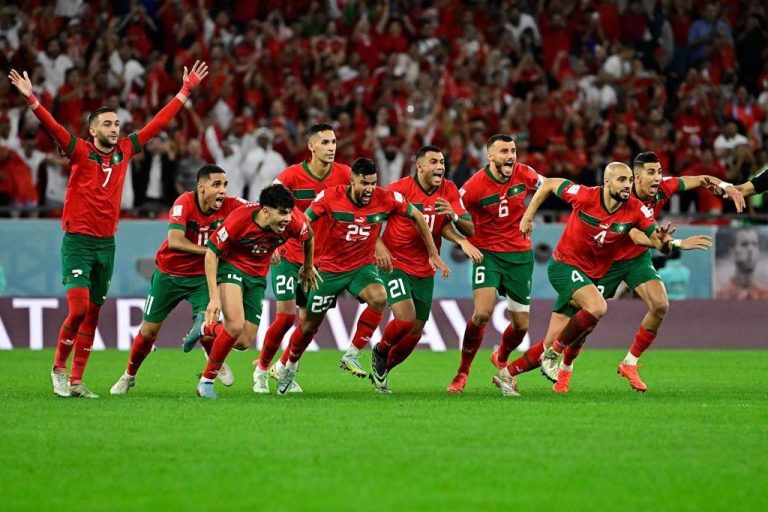 Morocco team celebrating at FIFA World Cup Pool Game