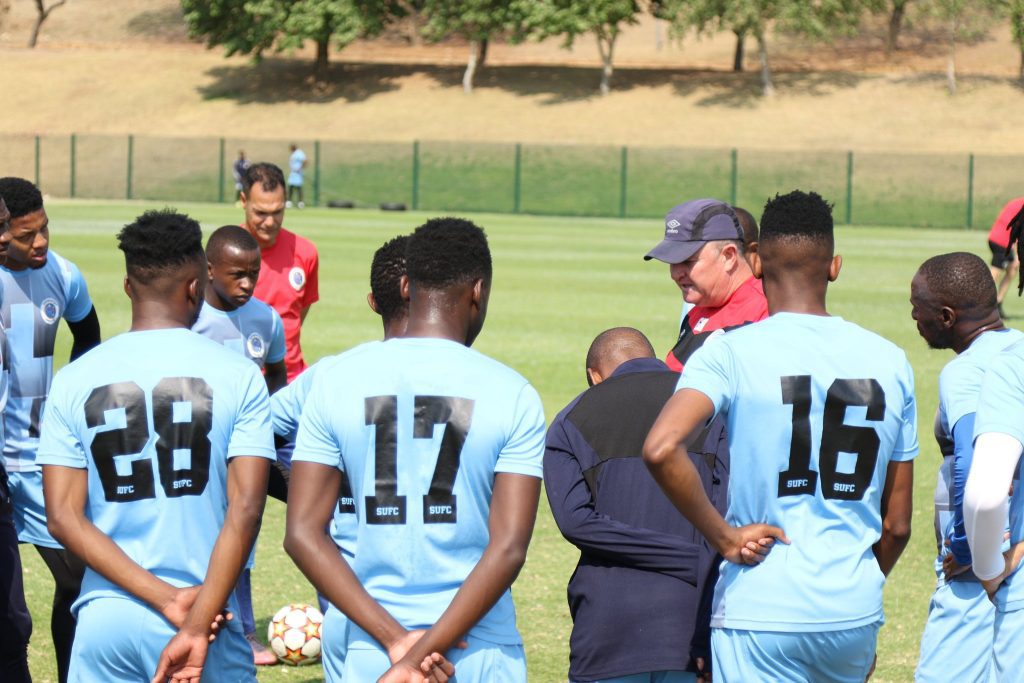 Supersport team huddling up before the game.