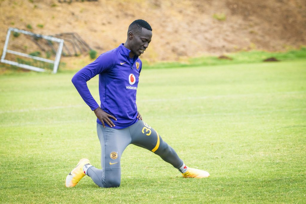 Caleb Bimenyimana stretching