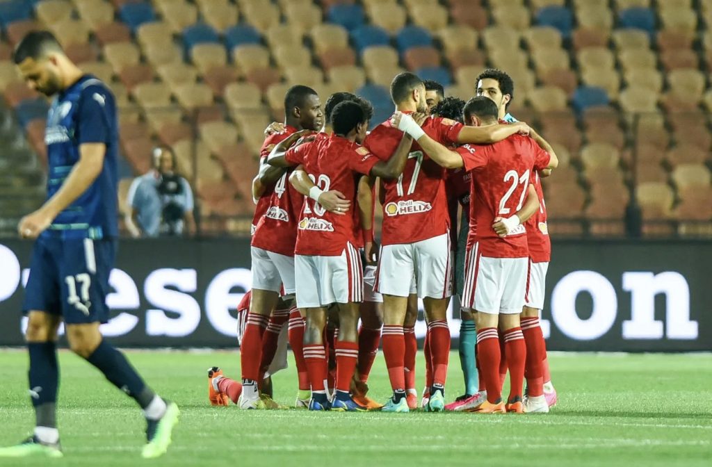 Percy Tau celebrating with Al Ahly teammates 