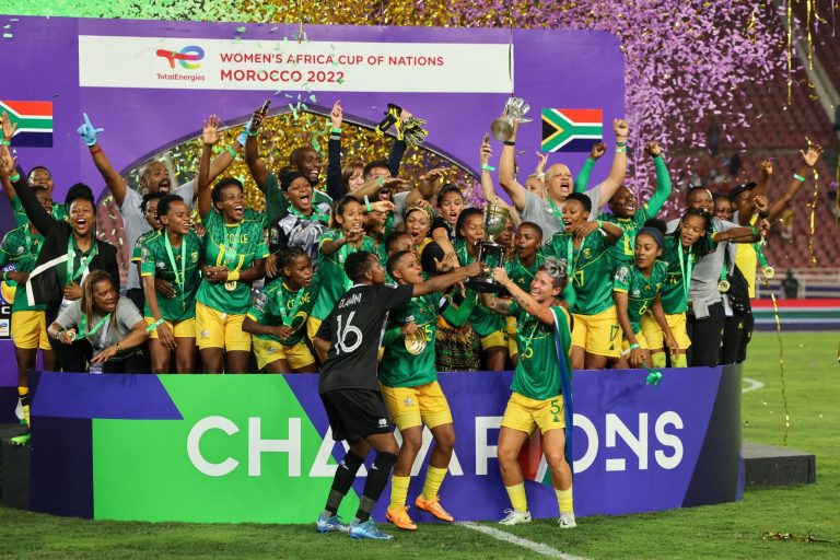 Desiree Ellis and Banyana Banyana celebrating after winning the WAFCON