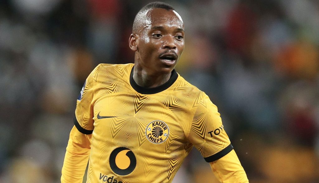 Khama Billiat playing football.