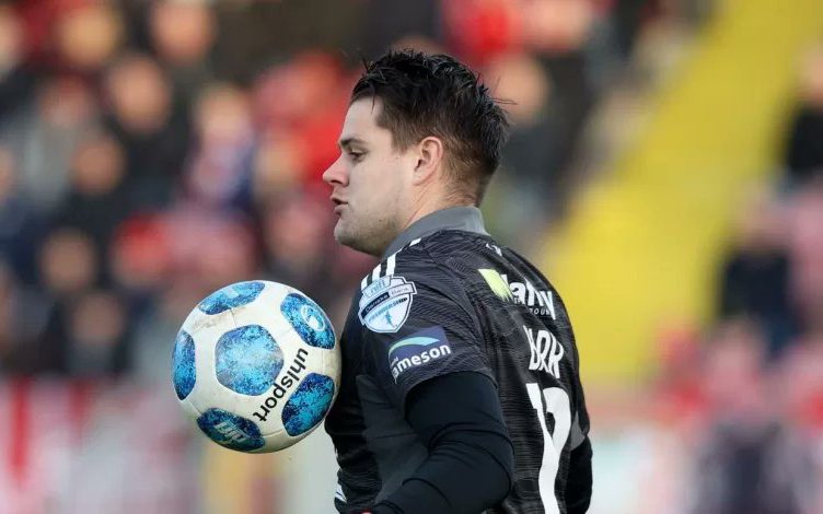 goalkeeper Jethren Barr playing football