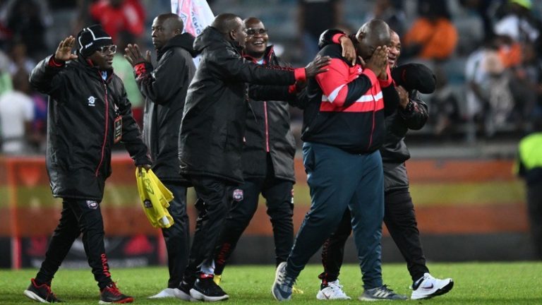 Morena Ramoreboli celebrating with Jwaneng Galaxy officials