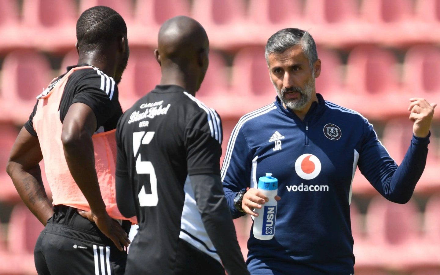 Jose Riveiro with Orlando Pirates players