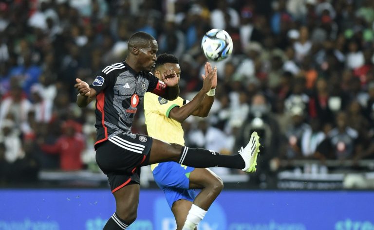 Pirates defender Tapelo Xoki and Sundowns' Themba Zwane in action