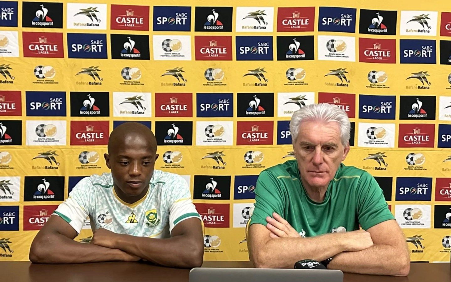 Zakhele Lepasa with Bafana Bafana coach Hugo Broos at a conference