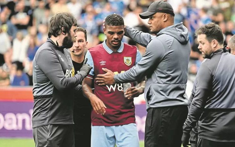 Lyle Foster with Vincent Kompany