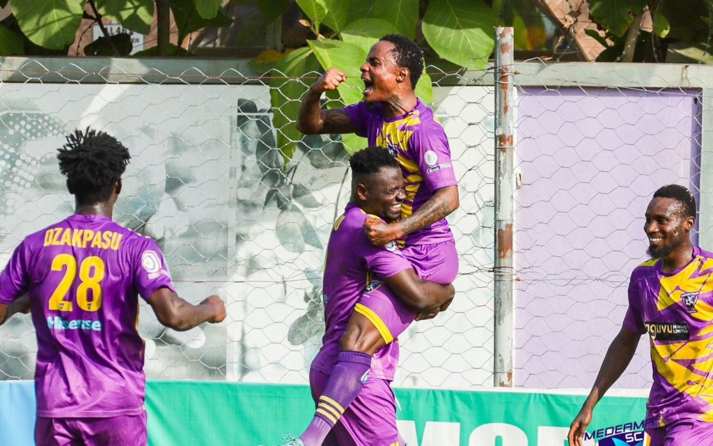 SuperSport United star Kuda Mahachi celebrating with teammates