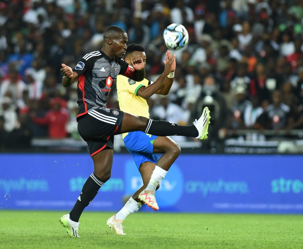 Pirates defender Tapelo Xoki and Sundowns' Themba Zwane in action